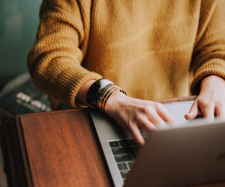 person using laptop computer